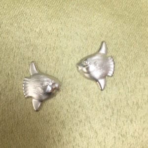 This image portrays Nautilus Jewelry Inc. Sterling Silver Mola Mola Earrings by Scuba Show | June 1 & 2, 2024.