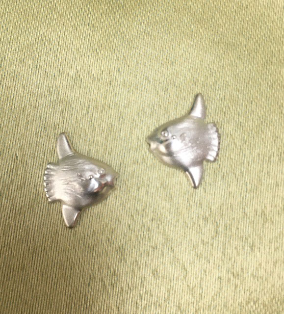 This image portrays Nautilus Jewelry Inc. Sterling Silver Mola Mola Earrings by Scuba Show | June 3 & 4, 2023.