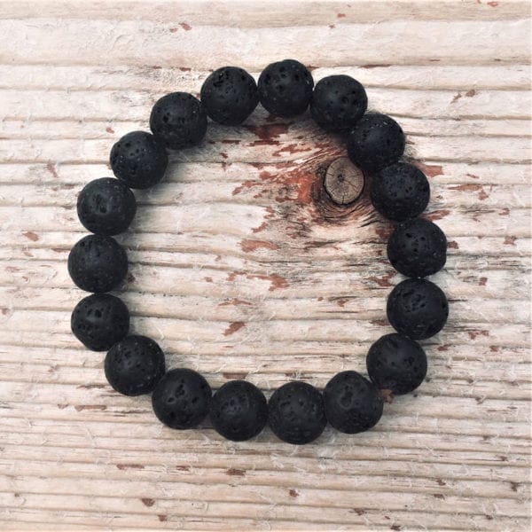This image portrays Gogh Jewelry Design Lava Stone Bracelet for Calming Emotions by Scuba Show | June 1 & 2, 2024.