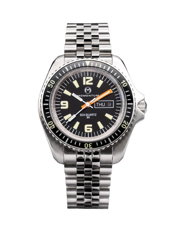 This image portrays The Momentum Sea Quartz 30 "Magnum PI" Dive Watch by Scuba Show | May 31 & June 1, 2025.